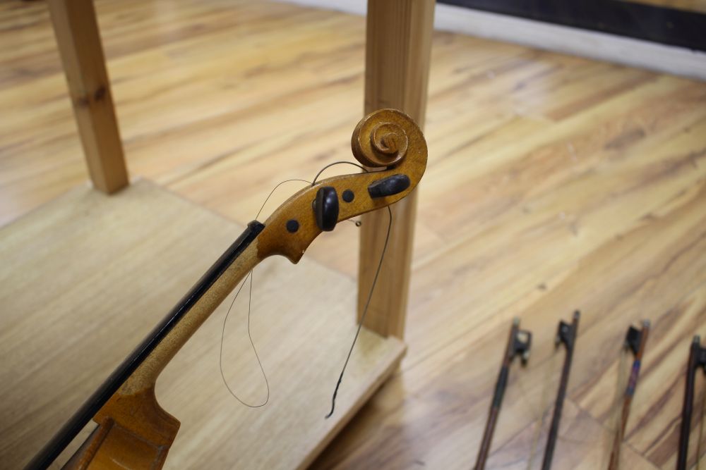A Chinese violin and four bows